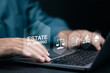 © Pakin - Estate Planning concept. Planning for the transfer of assets and Inheritance tax. Businessman use laptop with estate planning icons on virtual screen.