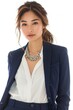 Portrait of a pretty young woman super model of Japanese ethnicity wearing a navy blue blazer over a white blouse and tailored trousers, accessorized with a statement necklace and pointed-toe pumps
