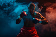 A man in a boxing ring with smoke in the background. The man is wearing boxing gloves and he is in the middle of a fight