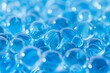 Macro of blue gel balls. Watery polymer hydrogel background. Generative AI