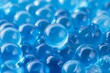 Macro of blue gel balls. Watery polymer hydrogel background. Generative AI