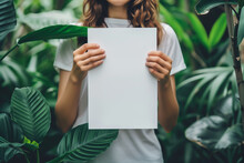 Beautiful Young Woman Holding Blank Paper In Jungle