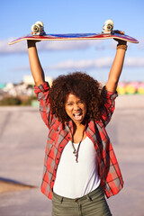 Canvas Print - Portrait, fashion and excited black woman with skateboard in city for exercise, training and skating in skatepark. Skater, shouting and face of female person for trendy, edgy and hipster clothing