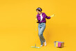 Full body young woman wear purple shirt casual clothes do housework tidy up hold in hand mop bucket water wash floor sing song in microphone isolated on plain yellow background. Housekeeping concept.