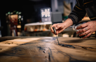 Poster - processing solid wood table with epoxy resin, handmade, handmade furniture production.