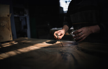 Poster - processing solid wood table with epoxy resin, handmade, handmade furniture production.