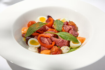 Sticker - Salad with roast beef, vegetables and eggs on white table with harsh shadows. Steak salad in modern style with shadows of leaves. Flashy food. Meat salad with pastrami in summer menu.