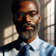 Farbiger Mann mit Bart und Brille