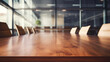 Empty wooden conference meeting table on background of a modern office