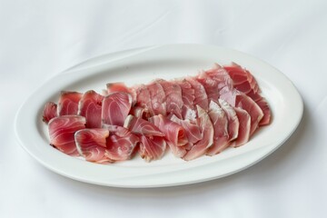 Wall Mural - thinly sliced tuna on a white plate