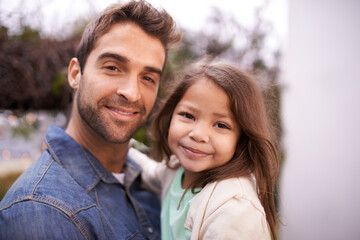 Poster - Portrait, love and father carry girl for bonding, outside and fun with care . Family, parent and young daughter or kid with smile in nature, embrace and happiness for vacation or travel with dad