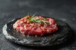 a professional photography of an expensive slit raw meat decorated on a plate on a black table with green leaves in a modern house during sunshine in the morning