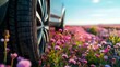  A car on summer tires in a flowering field. Summer tires concept. Change of season. summer tires