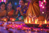 Fototapeta Las - Indian festival Diwali, Diya oil lamps lit on colorful rangoli
