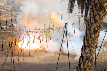 Canvas Print - Of firecrackers of different sizes during the Mascleta of Valencia, Spain