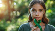 green ribbon symbol of fight against disease. World lymphoma awareness day. September 15. Liver, Gallbladders bile duct, kidney Cancer and Lymphoma Awareness month or Celiac disease awareness.