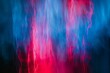 Abstract background of red, blue and pink smoke in the dark