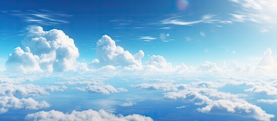 Wall Mural - The scene features clouds in the sky over the ocean with the sun radiating light, creating a picturesque view.