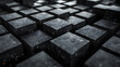 An array of uniformly shaped black cubes on a glossy surface, creating an abstract, mesmerizing pattern