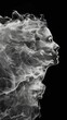 Artistic smoke: Monochromatic portrait of a woman's profile dissolving into smoke tendrils in motion.