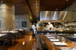 © Hunman - Modern restaurant with open kitchen.