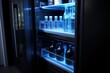 Modern black smart fridge with illuminated interior