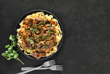 Canvas Print -  Homemade beef stroganoff with mushrooms and pasta