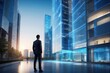 Business man with design modern building blue hologram, real estate for investment