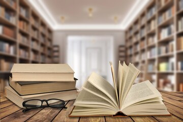 Wall Mural - Book stack on the desk in public library