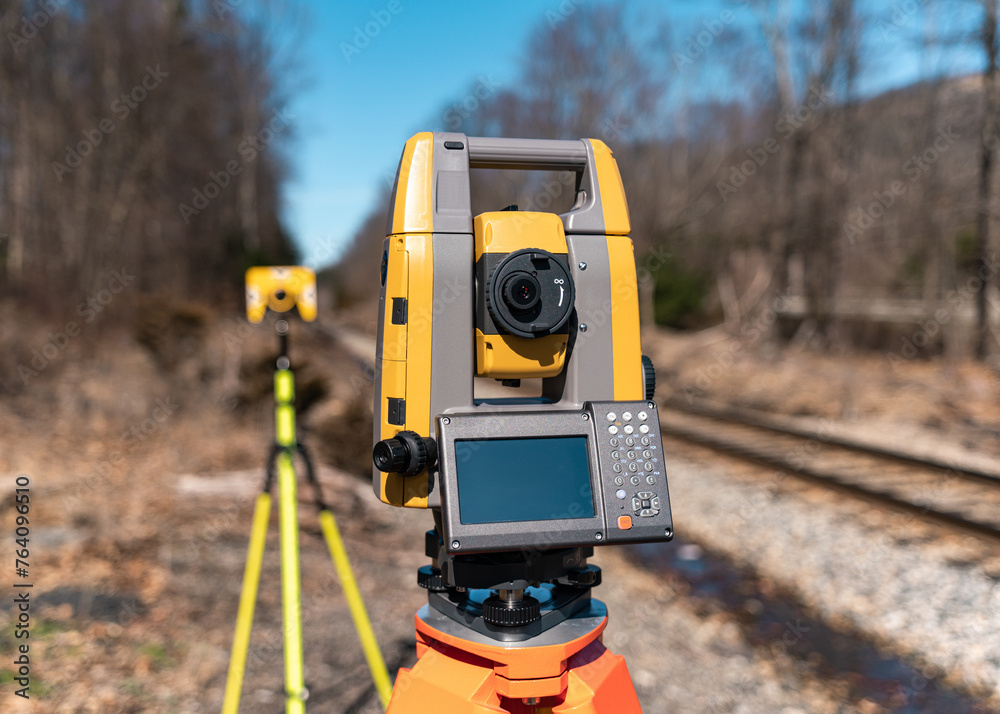 land surveying total station instrument on a tripod in the field Stock ...