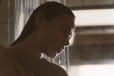 Fototapeta Miasto - lifestyle shower moments of a young woman at home.