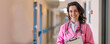 © MK studio - beautiful female doctor in a pink uniform in the hospital. medicine and healthcare