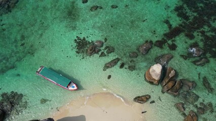 Wall Mural - Belitung beach and islands drone view. Beautiful aerial view of islands, boat, sea and rocks in Belitung, Indonesia 