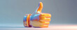 colorful thumbs up sculpture, with a copy space for text