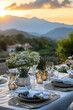 Mountain view outdoor dining set elegantly arranged for an alfresco meal at dusk