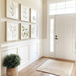 White wainscoting with frames on the wall in the style of modern farmhouse style, natural light from windows and door, light wood floor. Minimalist home entryway interior design.