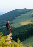Fototapeta Konie - Tourist in the Mountains in Summer