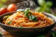 Freshly cooked spaghetti with basil and tomato sauce