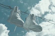 A Pair Of Worn-out Shoes Hangs From An Electrical Wire Against A Cloudy Sky, Basketball Shoes Hanging Off A Telephone Wire, Detailed Stitching And Laces Fluttering In The Wind, AI Generated