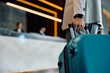 © Drazen - Close up of black man with suitcase arriving at hotel.