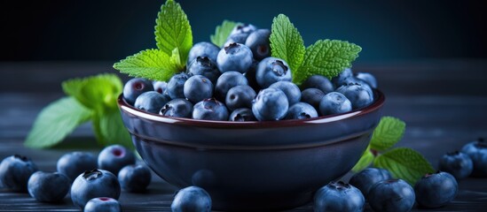 Canvas Print - Bowl of Fresh Blueberries and Mint Leaves