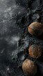 Dark, empty coconut shells on a black surface, enhancing its contrast. Traces of coal dust on black coconut shells in a rustic atmosphere.