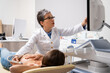 © Yakobchuk Olena - Patient Undergoing Diagnostic Examination in Clinic.