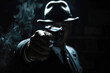 A man dressed in a mafia-like fashion with a pistol equipped with a silencer. His face is obscured by the dark lighting, giving him an ominous presence