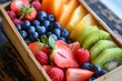 A wooden box filled to the brim with a diverse range of fresh and vibrant fruits, creating a colorful display, A colorful fruit salad contained in a bamboo lunch box, AI Generated