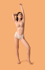 Sticker - Body positive woman in underwear on beige background