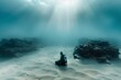 A lone scuba diver kneels contemplatively on the sandy ocean floor, surrounded by the serenity of underwater calm