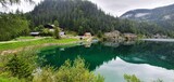 Fototapeta Do pokoju - House on the shore of a mountain lake in Austria. Gosauseen Austria 2022