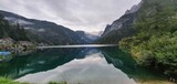 Fototapeta Do pokoju - The calm surface of the lake with the mountains reflected in it. Gosau Austria 2022