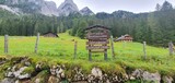 Fototapeta Do pokoju - Mountain landscape with board and fence